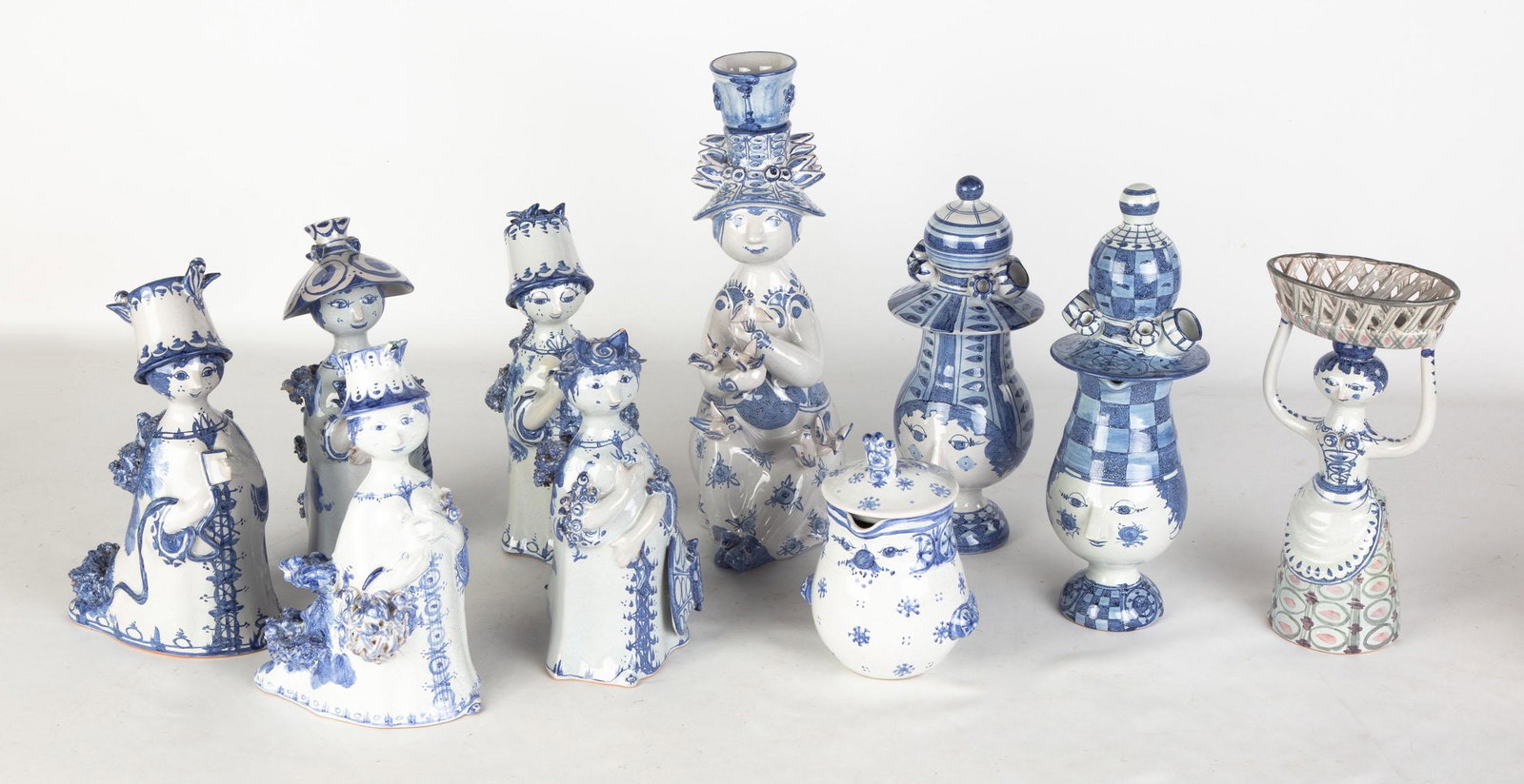 Bjørn Wiinblad (Danish, 1918-2006) Earthenware: Bjørn Wiinblad (Danish, 1918-2006) Earthenware Figures, Candlesticks and Creamers Wiinblad Studio Denmark, circa 1960. Hand-built and glazed earthenware. Max Ht. 12 3/4" The Lorraine & Sy Merrall Col