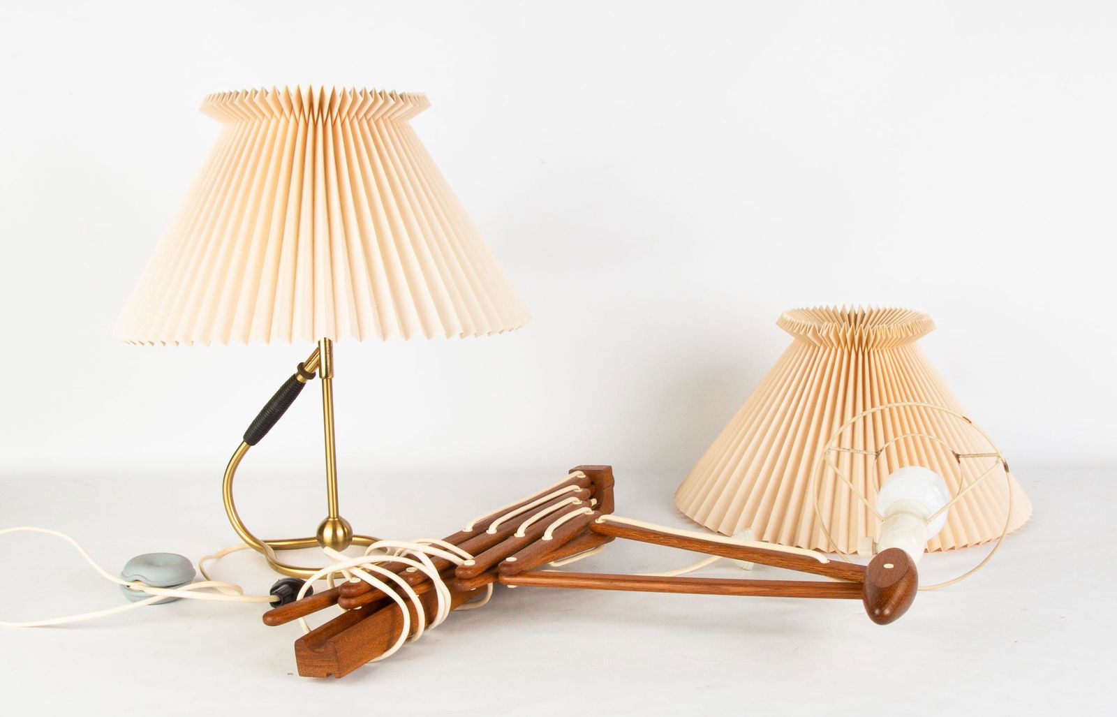 Kaare Klint (Danish, 1888-1954) 306 Brass Table Lamp &: Kaare Klint (Danish, 1888-1954) 306 Brass Table Lamp & Erik Hansen (Danish) Accordion Lamp Denmark. Lamp on adjustable base convertible to a sconce, with accordion shade, Model #306. Lamp Ht. 15 1/2"