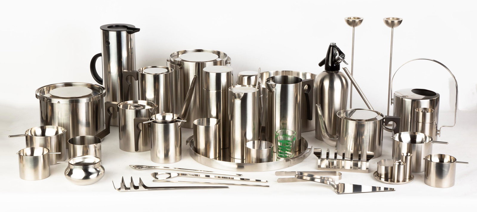Extensive Steel Serving Set of Arne Jacobsen for: Extensive Steel Serving Set of Arne Jacobsen for Stelton Arne Jacobsen, 1902-1971, Stelton Edelstahl, mostly Cylinda Line. Max Ht. 13" The Lorraine & Sy Merrall Collection, Rochester, NY
