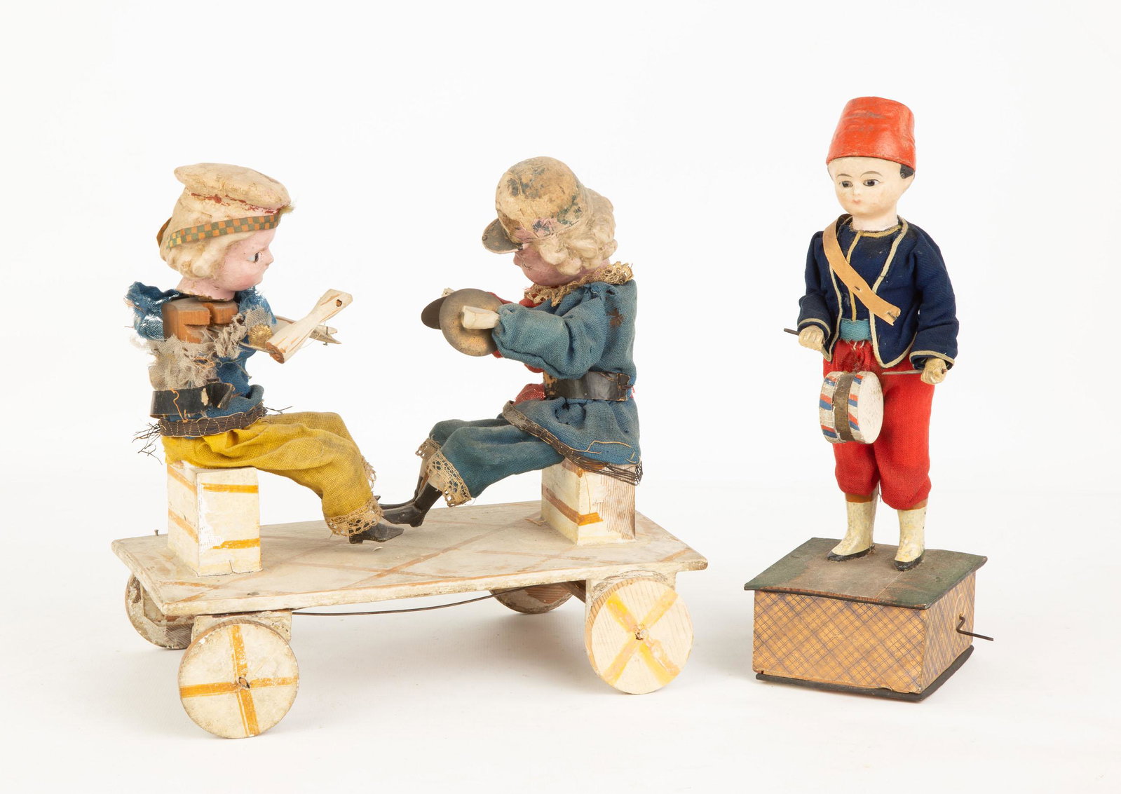 German Pull Toy and Mechanical Drummer Circa 1900. Max: German Pull Toy and Mechanical Drummer Circa 1900. Max Ht 10" Max W 10" Property of Strong Museum, sold to benefit the Museum's collections fund.