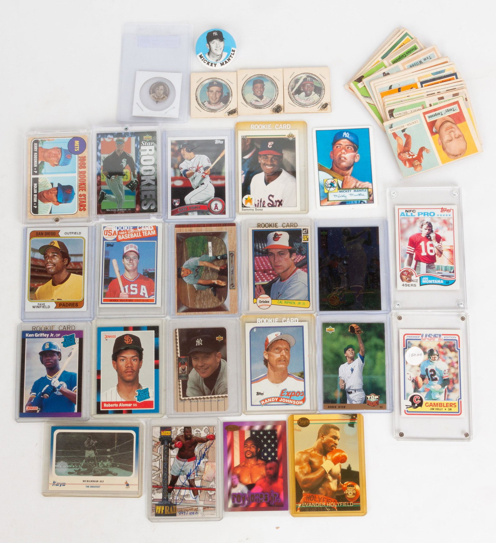 Group of Boxing, Baseball & NFL Trading Cards Jim: Group of Boxing, Baseball & NFL Trading Cards Jim Kelly, Joe Montana, Derek Jeter, Muhammad Ali, Evander Holyfield, Sammy Sosa, Ken Griffey Jr., Cal Ripken, etc. Mantle Card is porcelain, the rest are