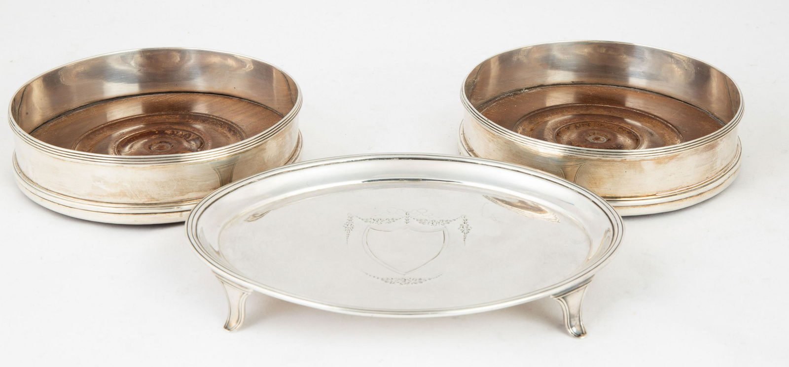 Silver Tea Stand and Two Silver Wine Coasters: Silver Tea Stand and Two Silver Wine Coasters circa 1800. Tea stand by Joseph Scammel. Weighable 5.4 ozt. L 7" An East Aurora, NY collection.