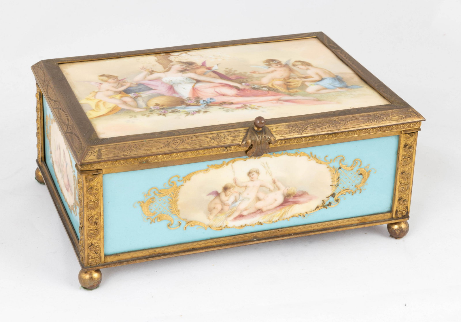 Porcelain and Gilt Brass Jewelry Box: Porcelain and Gilt Brass Jewelry Box 19th century. Hand painted panels. Artist signed. Ht. 4" W 9 1/2" D 6 1/2" The Estate of George Jamison, Corning, NY.