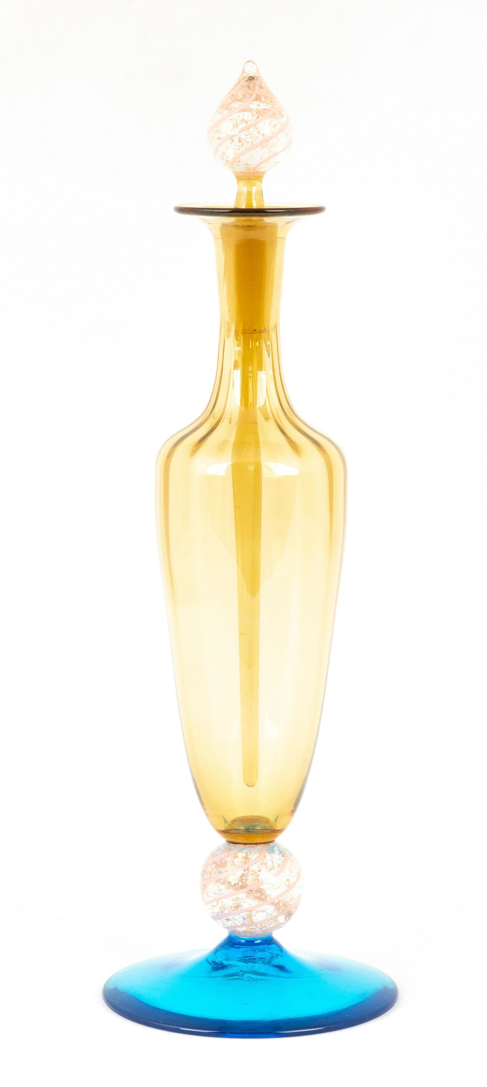 Steuben Cologne Bottle: Steuben Cologne Bottle Corning, NY. Celeste blue and amber, with swirl and mica flecks. Traces of paper label. Ht. 12 1/2" The Estate of George Jamison, Corning, NY.
