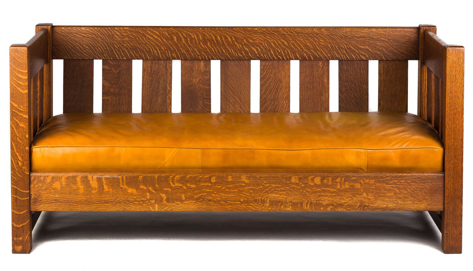 Arts & Crafts Slant Back Settee: Arts & Crafts Slant Back Settee Circa 1920 With orange leather cushions and pillows. W 65" Ht 30" D 28"