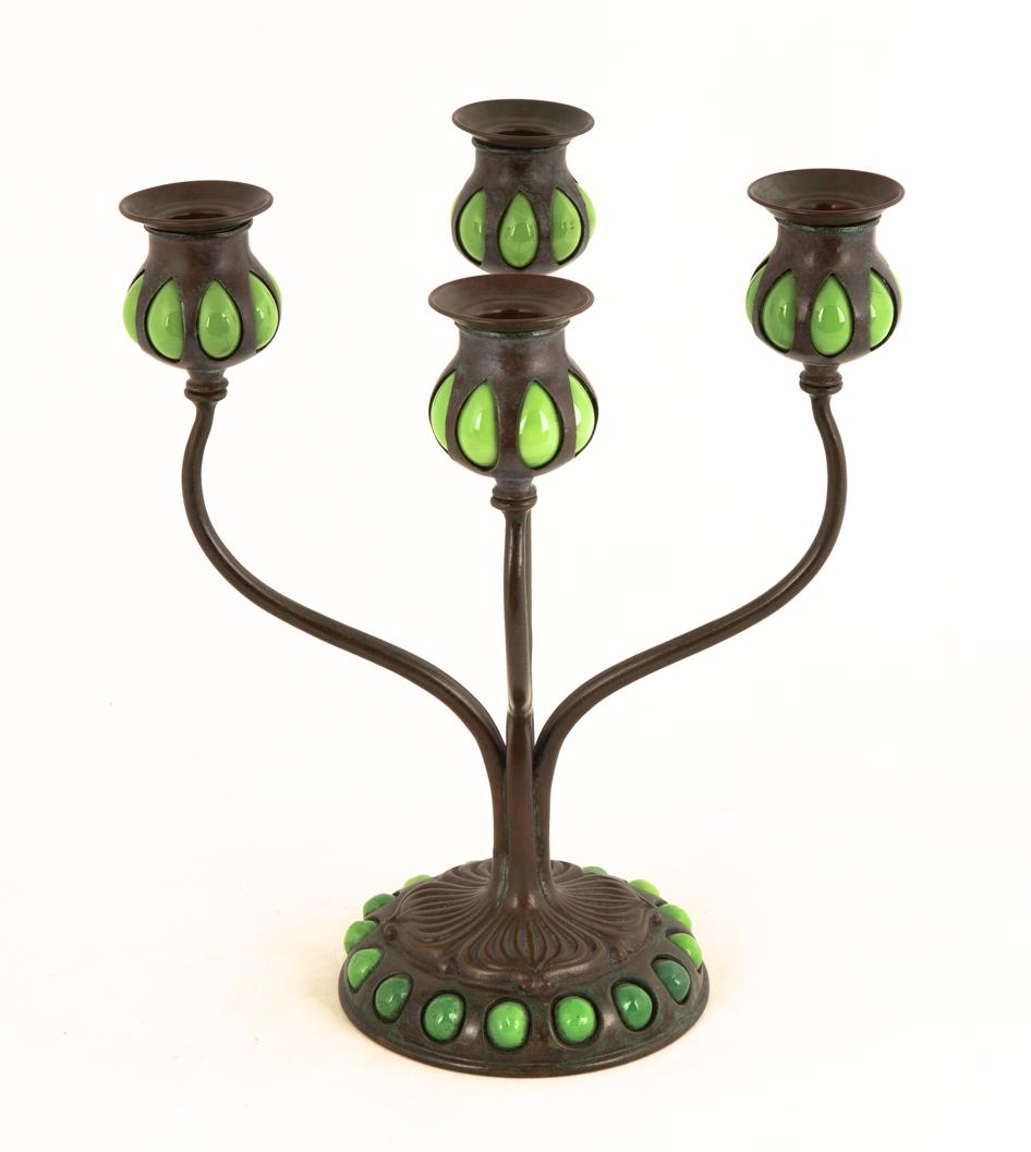 Tiffany Studios, New York, Candelabra: Tiffany Studios, New York, Candelabra Bronze with blown out glass and jewels. Brownish-green patina. Impressed 'TIFFANY STUDIOS NEW YORK 22324' with decorative monogram. Ht. 12 1/2 W 10 1/2 in.