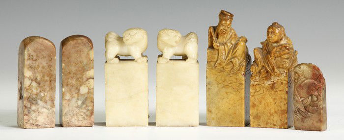Group of Soapstone & Hardstone Oriental Seals: 19th cent. L to R: Inscribed, some sm. nicks to edges, exc. Carved Foo Dogs, exc. Carved figural, some sm. nicks to edges and one figure, no stamp on bottom. Carved fish, exc. Max. Ht.3 1/2" A Buffalo