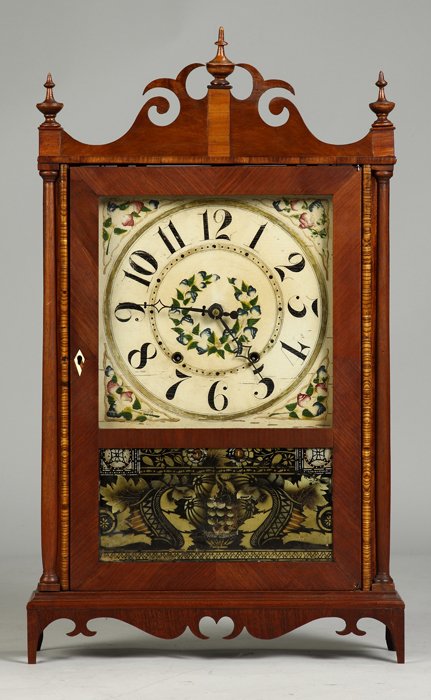 Samuel Terry Whale's Tail Pillar & Scroll: Mahogany case, restorations to base and crest. Period glass, cracked. Original painted wood dial. 30 hour time and strike, weight driven, wood works movement. A Southern Collection. Ht. 29"