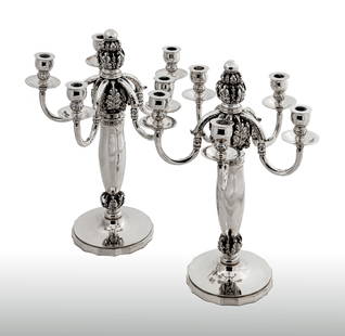 Pair of Fine and Rare Silver Five-Light Candelabra, Georg Jensen: Pair of Fine and Rare Silver Five-Light Candelabra, Designed by Georg Jensen, Mark of Georg Jensen, Cophenhagen, 1925-1932 Each on a circular base with incurved sides, the vase-shaped stem with openwo