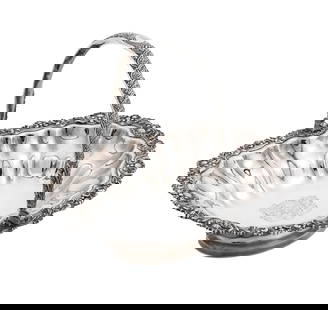 Paul Storr Silver Cake Basket: Paul Storr Silver Cake Basket With coat of arms, motto: Fortitudine et prudentia, gadrooned borders with foliate and shell design. Weight: 38.9 troy ounces. Ht. 10 3/4 x W 14 1/4 x D 11 1/4 in. Collec