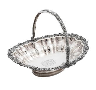 Paul Storr Silver Cake Basket: Paul Storr Silver Cake Basket With coat of arms, motto: Fortitudine et prudentia, gadrooned borders with foliate and shell design. Weight: 38.9 troy ounces. Ht. 10 3/4 x W 14 1/4 x D 11 1/4 in.