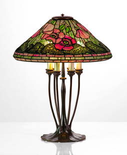 Tiffany Studios "Poppy" Table Lamp: Tiffany Studios "Poppy" Table Lamp Circa 1910. Leaded glass, patinaed bronze. An organic form 6-light base with six favrile glass candle sleeves and original push-pull switch, impressed 'TIFFANY STUDI