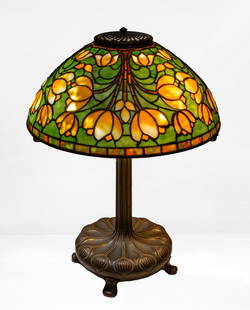 Tiffany Studios "Crocus" Table Lamp: Tiffany Studios "Crocus" Table Lamp Circa 1903-1905. Leaded glass, patinaed bronze. Shade with a small early tag impressed TIFFANY STUDIOS NEW YORK. Base impressed TIFFANY STUDIOS NEW YORK 26878. Lite