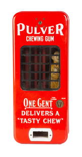 Pulver Company Chewing Gum Dispenser: Pulver Company Chewing Gum Dispenser Circa 1920s. Early mechanical coin operated vendor with porcelain case featuring embossed tin litho figure of The Yellow Kid character on inside. The Pulver