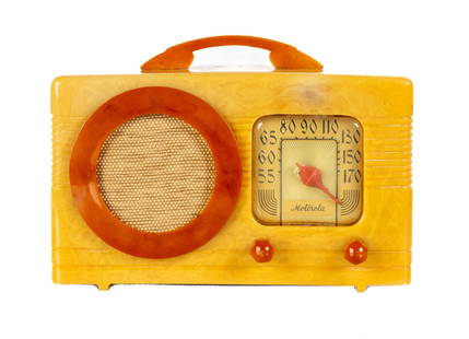 Motorola 50X Catalin Radio in Yellow with Faux Tortoise Trim: Motorola 50X Catalin Radio in Yellow with Faux Tortoise Trim Circa 1940. Art deco radio manufactured by Motorola Radio. Model 50X also known as the circle grille radio. Ht. 6 3/4 x W 9 3/4 x D 6 1/2