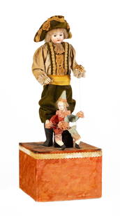 Musical Doll Puppeteer Automaton: Musical Doll Puppeteer Automaton Circa 1900. Boy is dressed in period fabric costume with fine lace work and puppeteering a marionette. Head and hands are made from porcelain with realistic features.