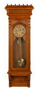 William L. Gilbert Clock Co. Regulator #11: William L. Gilbert Clock Co. Regulator #11 William L. Gilbert Clock Co. Winsted, Connecticut. Circa 1891. Oak case with original paper dial. 8-day time and strike. Ht. 50 in. Collection of Dr.