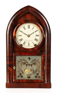 Brewster & Ingrahams Beehive Clock: Brewster & Ingrahams Beehive Clock Bristol, Connecticut. Circa 1840. Rosewood case, original painted metal dial and etched glass tablet. Iron cup movement. Ht. 19 1/4 x W 10 3/4 in x D 4 1/4 in.