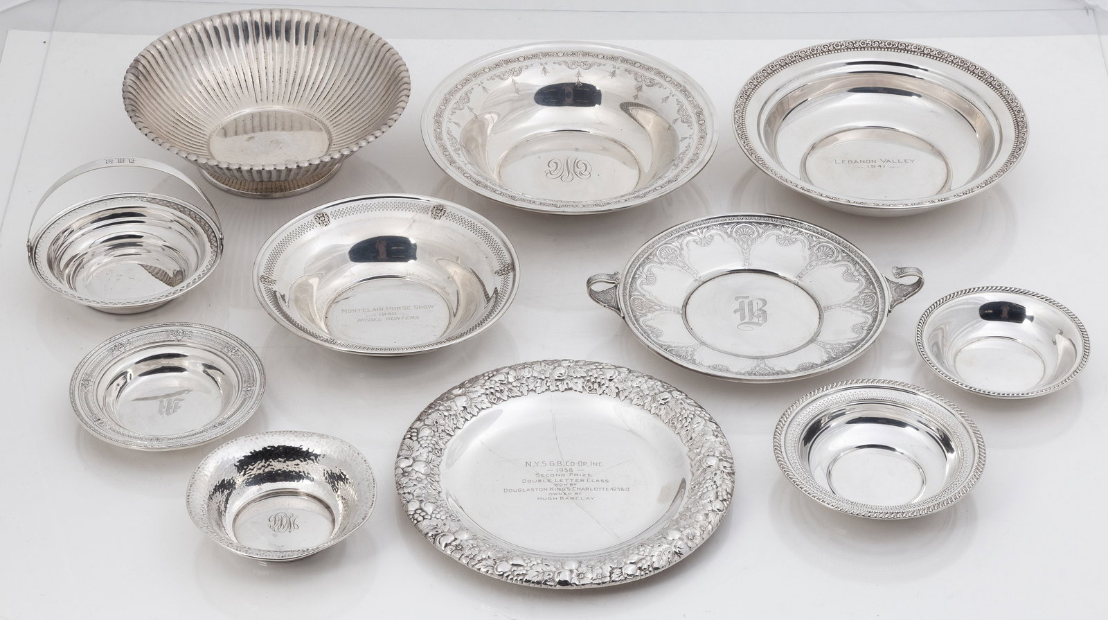 Group of Sterling Silver Footed Bowls and Platters: Group of Sterling Silver Footed Bowls and Platters Weight: 81 troy ounces. Makers include: Rita Barton, International Silver Company, Amston, Heather Mathews, Wallace, J.S. & Co. Max Ht. 3 in. Max D.