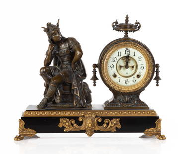 Ansonia Figural Clock: Ansonia Figural Clock Late 19th century. Patinaed metal with porcelain dial, Arabic numerals. 8-day time and strike. 14 3/4 x 17 3/4 x 7 1/4 in.