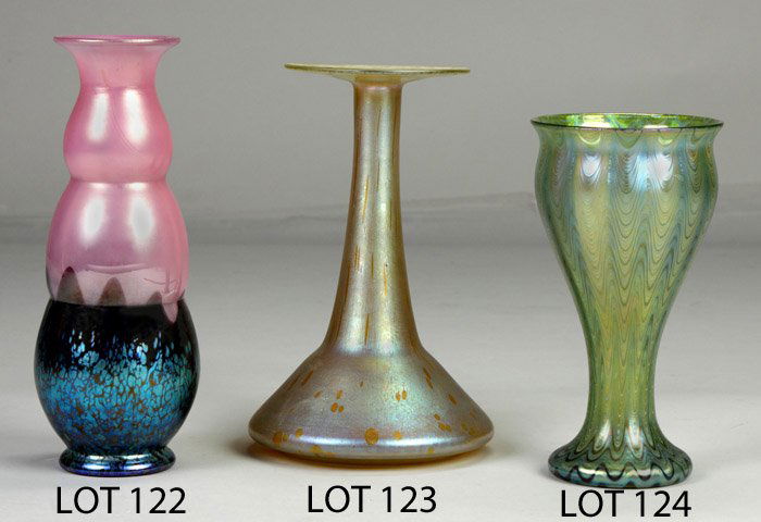 Loetz Vase: Loetz Vase. Sgn. Loetz, Austria. Zipper design, blue & green iridescence, slight ribbing. Ht. 9 1/2". Property from The Strong, sold to benefit the museum's collections fund.