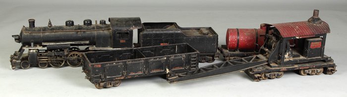 Buddy L Pressed Steel Outdoor Train: Buddy L Pressed Steel Outdoor Train. Inc. engine, tender, tankard car, coal car, steam shovel, 8 pcs. of track. Engine L 26".
