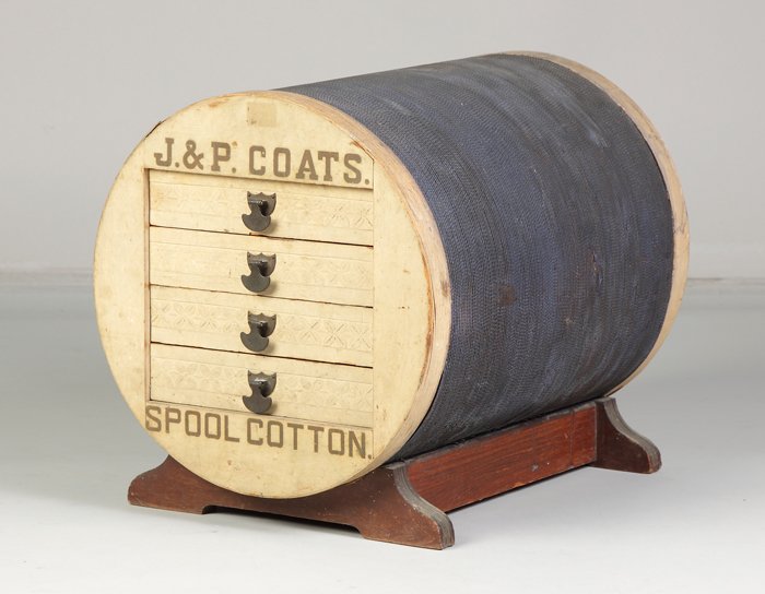 Unusual J.P. Coats Spool Cabinet: Unusual J.P. Coats Spool Cabinet. In shape of the spool of thread. Ht. 18 1/2" W 17" D 22".Property from The Strong, sold to benefit the museum's collections fund.