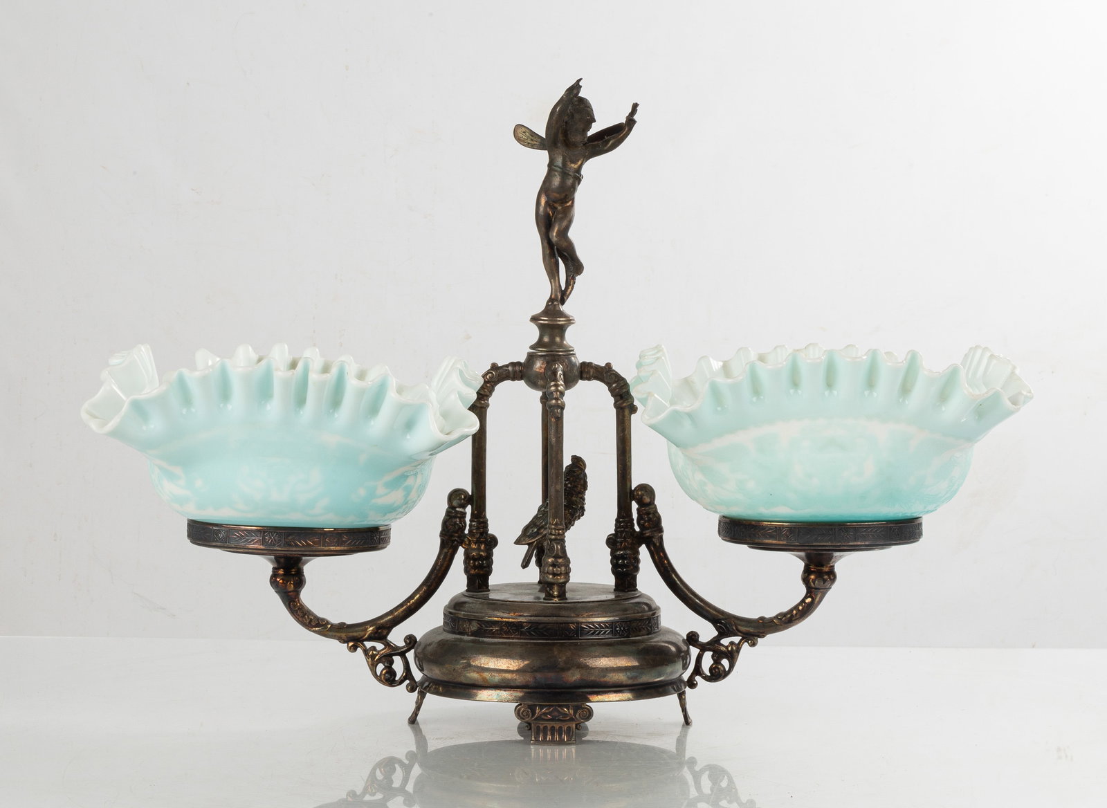 Pairpoint & Mount Washington Centerpiece: Pairpoint & Mount Washington Centerpiece Circa 1900, double Mount Washington bridal baskets. Ht. 13 1/2 in. W. 19 in. Provenance: The important collection of Dr. Martin May, Plantation, Florida.