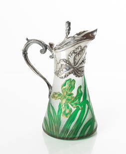 Rare French Art Nouveau Silver-Mounted Daum Nancy Cased Glass Claret Jug: Rare French Art Nouveau Silver-Mounted Daum Nancy Cased Glass Claret Jug Circa 1896. Slightly tapered cameo green-cut-to-opaque with flowering irises and highlighted with gilt. Signed on base 'Daum Na