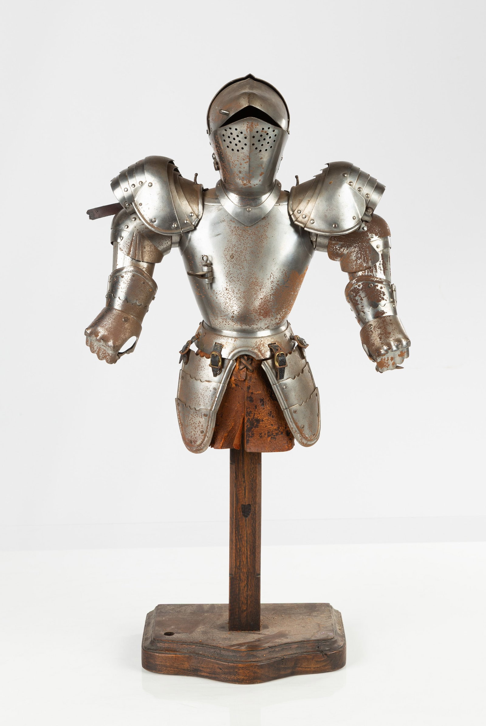 Miniature Suit of Armor: Miniature Suit of Armor 19th century. Augsburg style. Forged iron and leather on wooden stand. Ht. 23 in. A Connecticut estate.