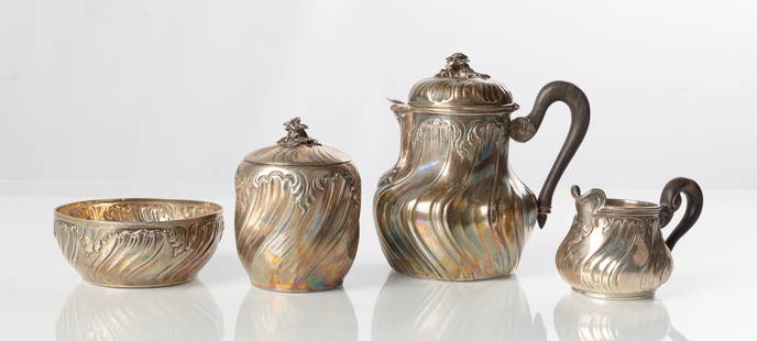 French Sterling Silver Demitasse Tea Service: French Sterling Silver Demitasse Tea Service Circa 1900. Repousse silver with carved wooden handles. Weight: 18.6 troy ounces. Purchase Note: New customers purchasing silver, gold, or jewelry are requ