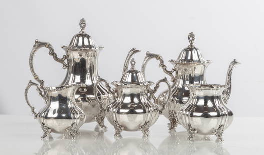 Poole Five-Piece Sterling Silver Tea & Coffee Service: Poole Five-Piece Sterling Silver Tea & Coffee Service Total weight: 102.9 troy ounces. Purchase Note: New customers purchasing silver, gold, or jewelry are required to make payment by wire or check un