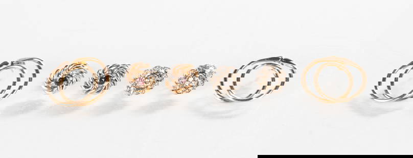 Three Pairs of Ladies' 14K Gold Earrings: Three Pairs of Ladies' 14K Gold Earrings Total weight: 11.23 grams. Outside - 14K gold double interlocking circle design. Left - 14K gold and white gold knot style with garnets. Garnet weight: 0.28 ct