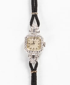Ladies' Platinum & Diamond Movado Watch