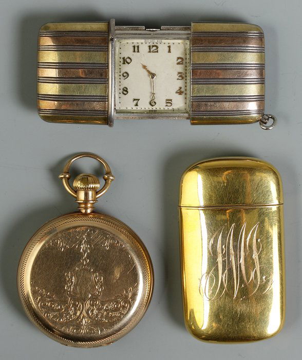 2 Watches & Match Holder: 2 Watches & Match Holder. Clockwise from top: Movado Factories 14K gold watch, #1192271, L 1 3/4", 43.8 dwt. 14K gold match holder, monogrammed, Ht. 2 1/4", 11.8 dwt. Elgin 14K Gold watch, #209486, po