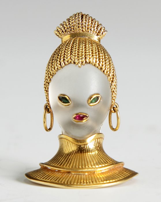 Van Cleef & Arpels Rock Crystal, Emerald & Ruby Brooch: Van Cleef & Arpels Rock Crystal, Emerald & Ruby Brooch. Designed as the head of a girl, the face in sculpted rock crystal, the eyes set with marquise-shaped emeralds, the mouth with a ruby, the hair,