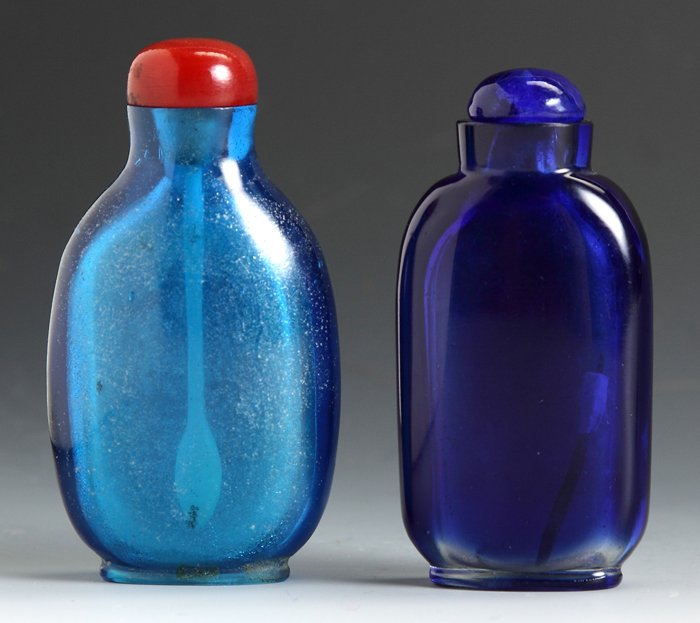 Two Blue Glass Snuff Bottles: Two Blue Glass Snuff Bottles. Ovate flattened flask, Ht. 3"; Cobalt, straight sided flattened flask, Ht. 2 1/2".