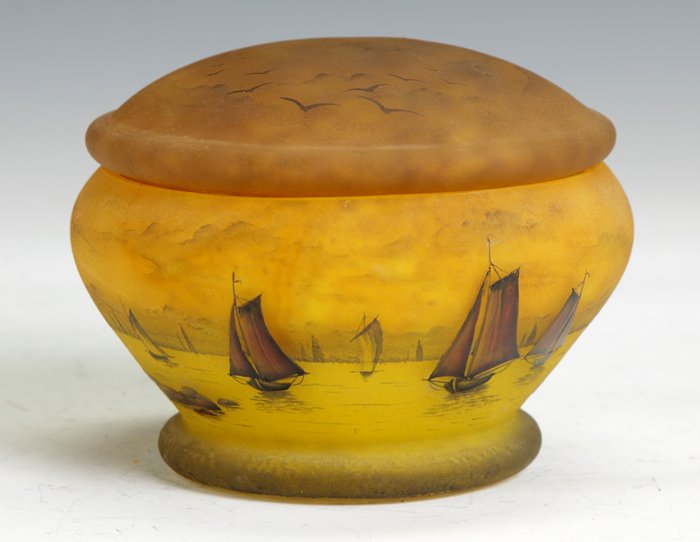 Daum Nancy Covered Dresser Box: Daum Nancy Covered Dresser Box. Sgn. Daum Nancy. Decorated w/sailboats & harbor, birds in flight on lid. Ht. 4 1/2" Dia. 6". Dr. George & Angie Shaheen Collection, Fayetteville, NY.