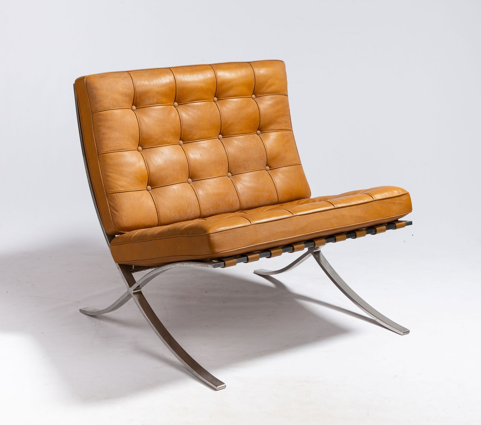 Ludwig Mies van der Rohe Vintage Barcelona Chair: Ludwig Mies van der Rohe Vintage Barcelona Chair Chrome and cognac leather. Unmarked. 30 x 30 x 30 in. Private collection, Buffalo, New York. Shipping Note: This item is pick-up or hand-delivery only.