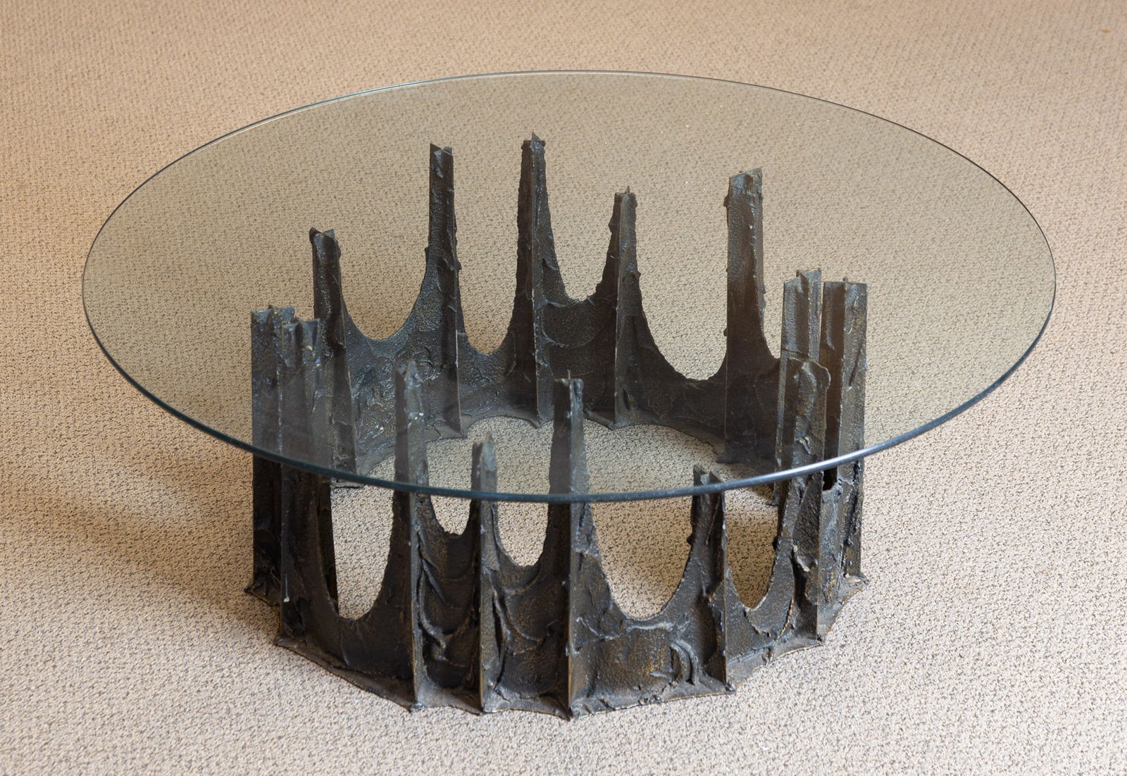 Paul Evans Bronze Brutalist "Stalagmite" Coffee Table: Paul Evans Bronze Brutalist "Stalagmite" Coffee Table Bronze, glass. Signed 'P E 73' Ht. 16 in. Dia. 42 in. Shipping Note: This item is pick-up or hand-delivery only.