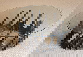 Paul Evans Bronze Brutalist "Stalagmite" Coffee Table: Paul Evans Bronze Brutalist "Stalagmite" Coffee Table Bronze, glass. Signed 'P E 73' Ht. 16 in. Dia. 42 in. Shipping Note: This item is pick-up or hand-delivery only.