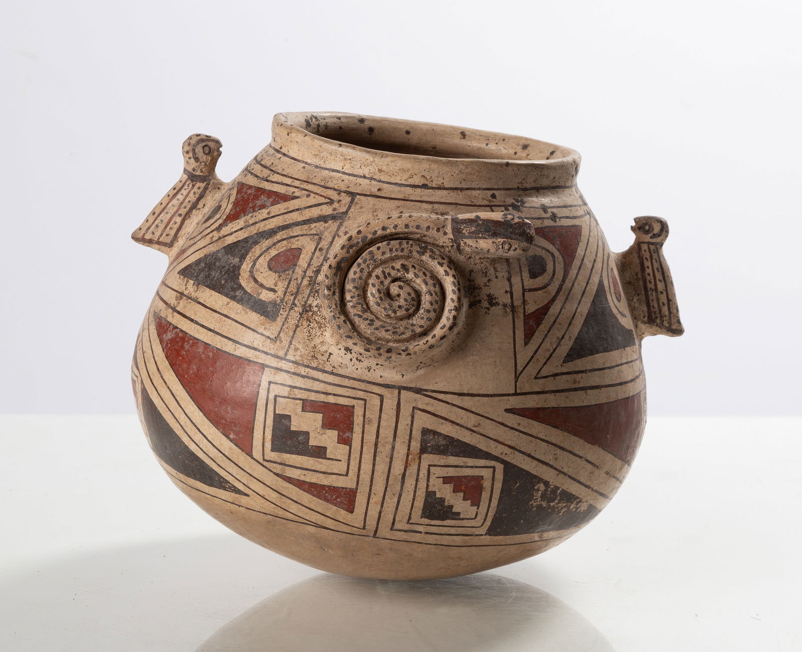 Casas Grandes or Paquime Bowl: Casas Grandes or Paquime Bowl Ancient, pre-Columbian. Polychrome painted ceramic. Ht. 7 1/2 in. Shipping Note: We provide our own in-house shipping service. Please reach out to us with any inquiries.