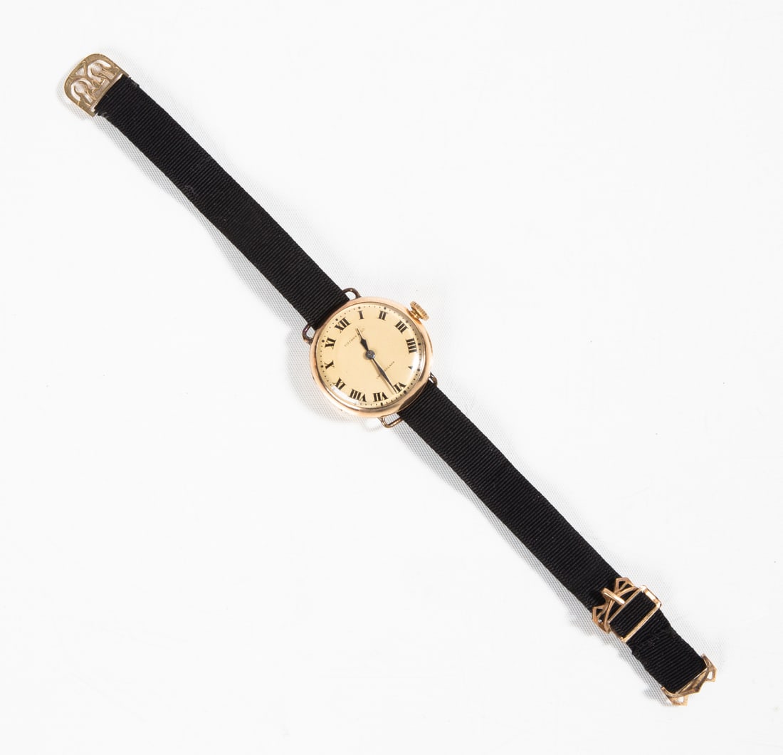 Tiffany & Co. 18K Gold Wristwatch, Longines Movement: Tiffany & Co. 18K Gold Wristwatch, Longines Movement Longines, Swiss movement. 15 jewels. Weight: 21.1 grams. 29mm Purchase Note: New customers purchasing silver, gold, or jewelry are required to make