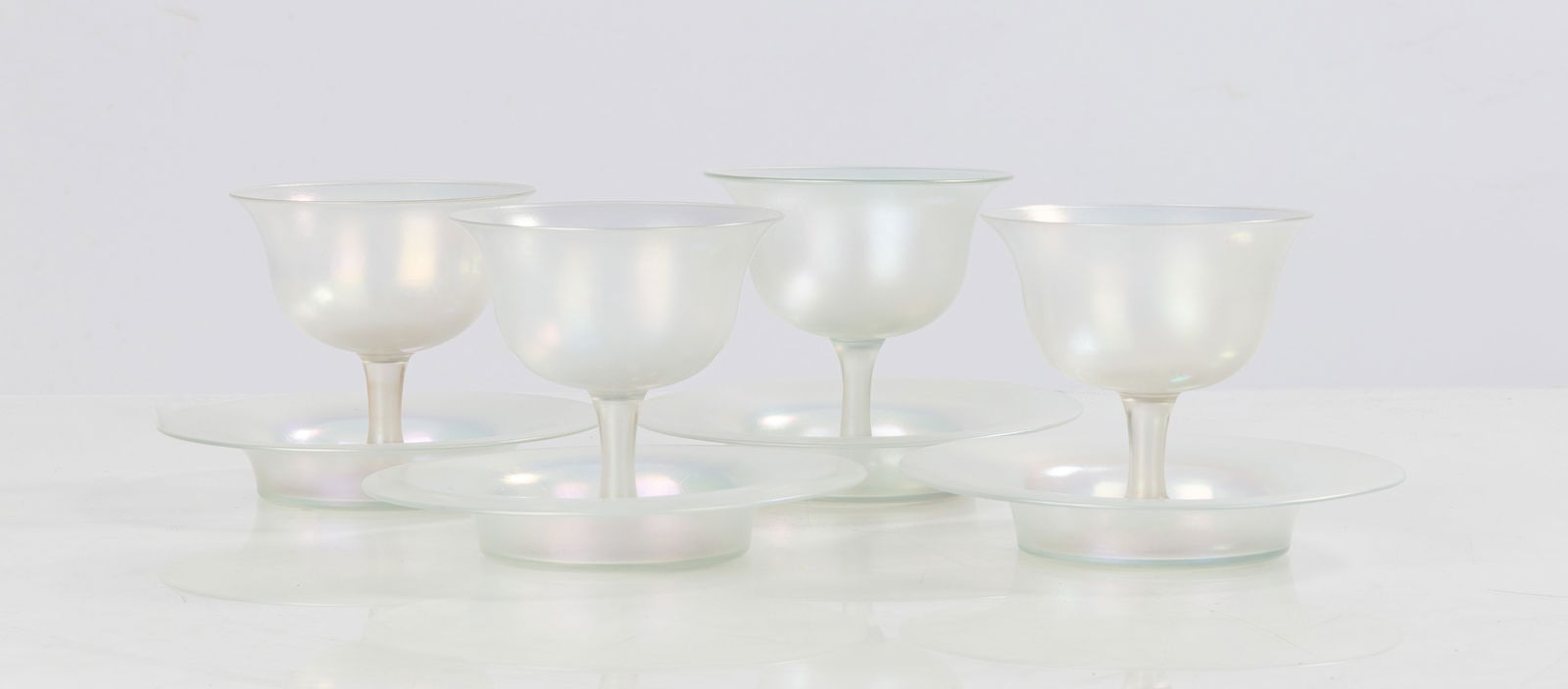 Steuben Verre de Soie Sherbets: Steuben Verre de Soie Sherbets Corning, New York, early 20th century. Blown glass. Some pieces with Fleur-de-lis signature. Ht. 4 in. Shipping Note: We provide our own in-house shipping service. Pleas