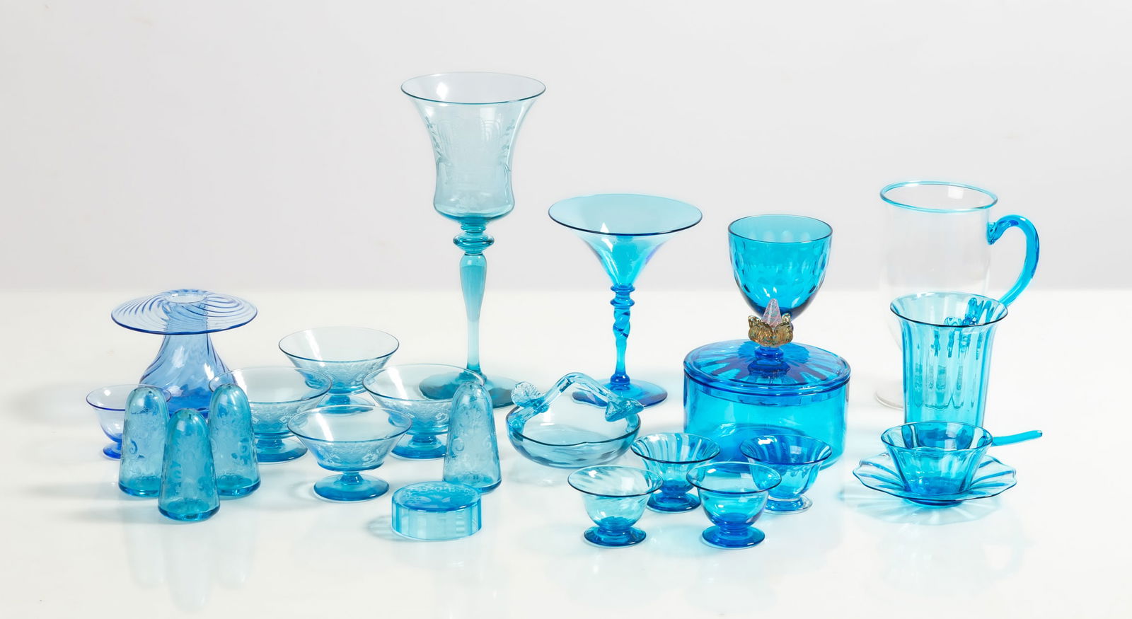 Steuben Celeste & Flemish Blue Tableware: Steuben Celeste & Flemish Blue Tableware Corning, New York, early 20th century. Blown glass. Max Ht. 9 1/4 in. The collection of Bill Mehlenbacher (1943-2023). Shipping Note: We provide our own in-hou