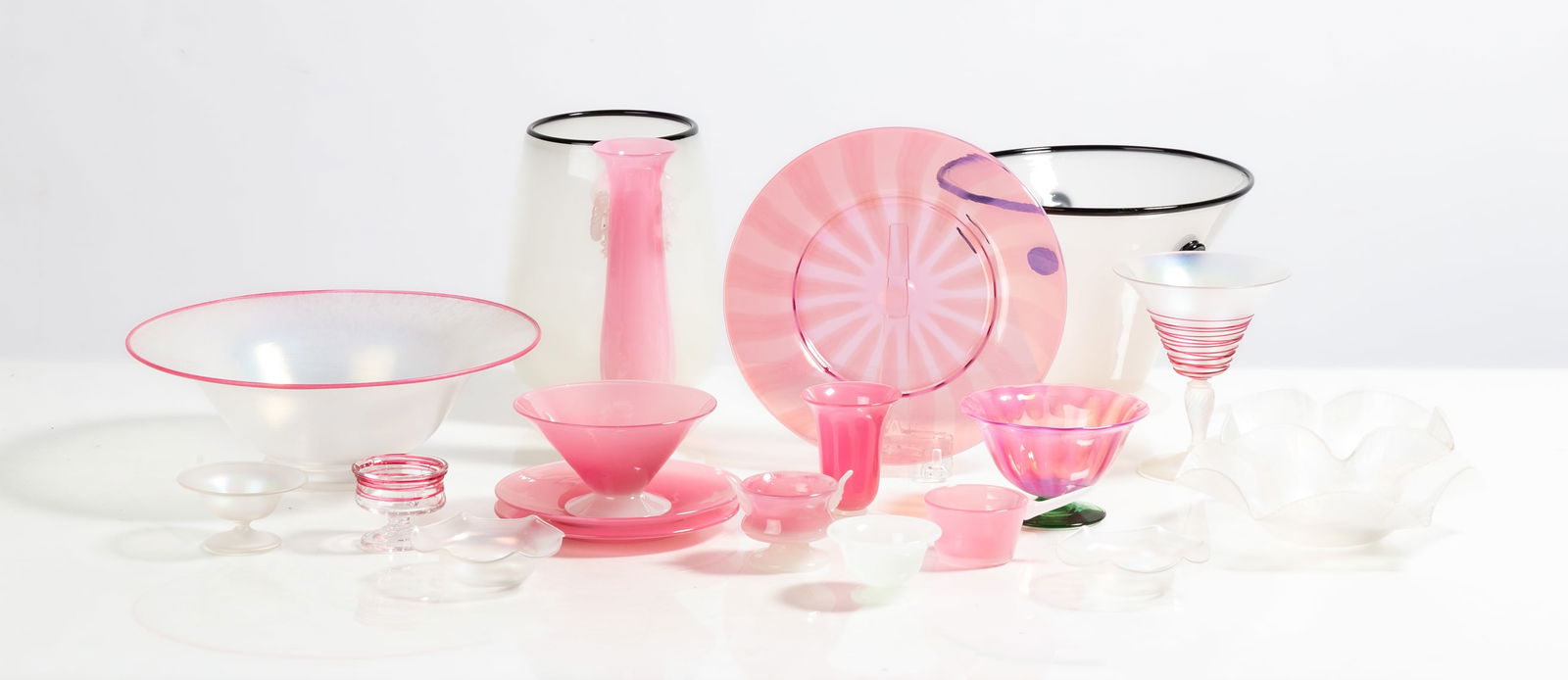 Steuben Tableware: Steuben Tableware Corning, New York, early 20th century. Blown glass. Alabaster, pink, and clear. Ht. 8 1/4 in. The collection of Bill Mehlenbacher (1943-2023). Shipping Note: We provide our own in-ho