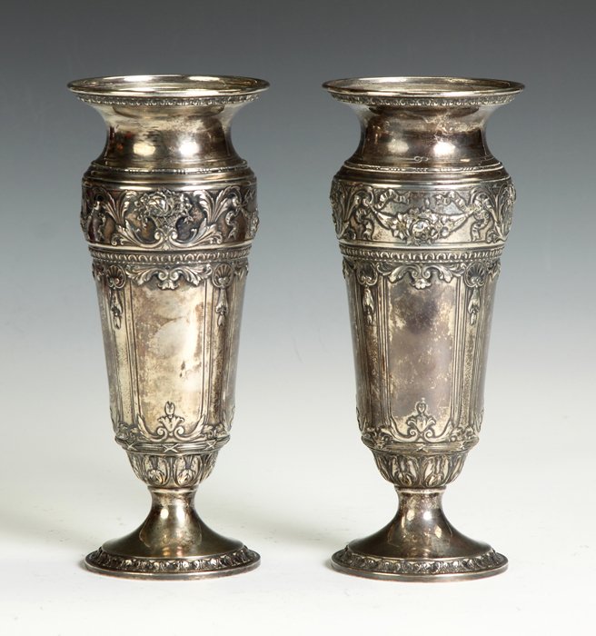 Pair of Sterling Silver Vases: Pair of Sterling Silver Vases. Hallmark WBW. Theodore B. Starr. Classical Repousse design. Ht. 8 1/2".