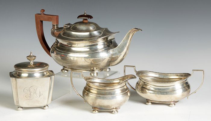 3 Piece Sterling Silver Tea Set together with Tea Caddy: 3 Piece Sterling Silver Tea Set together with Tea Caddy. Georgian, ball feet, gadrooned top. Hallmark A Bros. Ltd. 41.3 ozt. Max. Ht. 5 1/2".