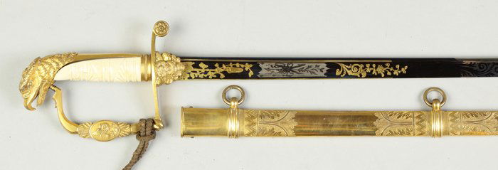 Officer's Eagle Head Presentation Sword: Officer's Eagle Head Presentation Sword. Etched, engraved & blued blade in near mint condition. Engraved brass scabbard. Overall L 35"; Blade L 30". The Rochester Historical Society.