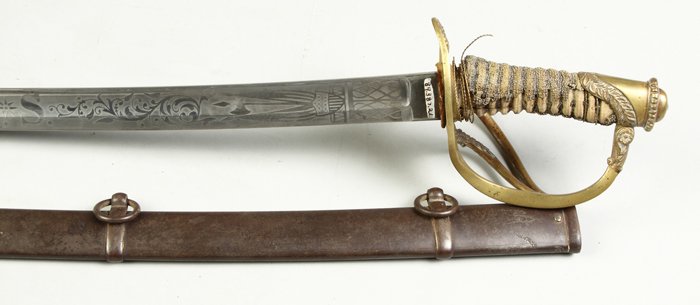 Civil War Sword: Civil War Sword. Engraved blade w/US flags & shield, marked BM. Sharkskin handle, loss. L 40". The Rochester Historical Society.